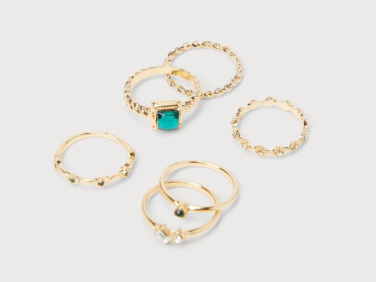 A gold and green rhinestone ring set from Lulus