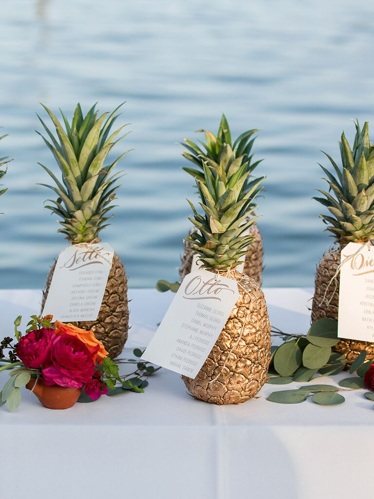 Gold pineapple seating chart tropical wedding