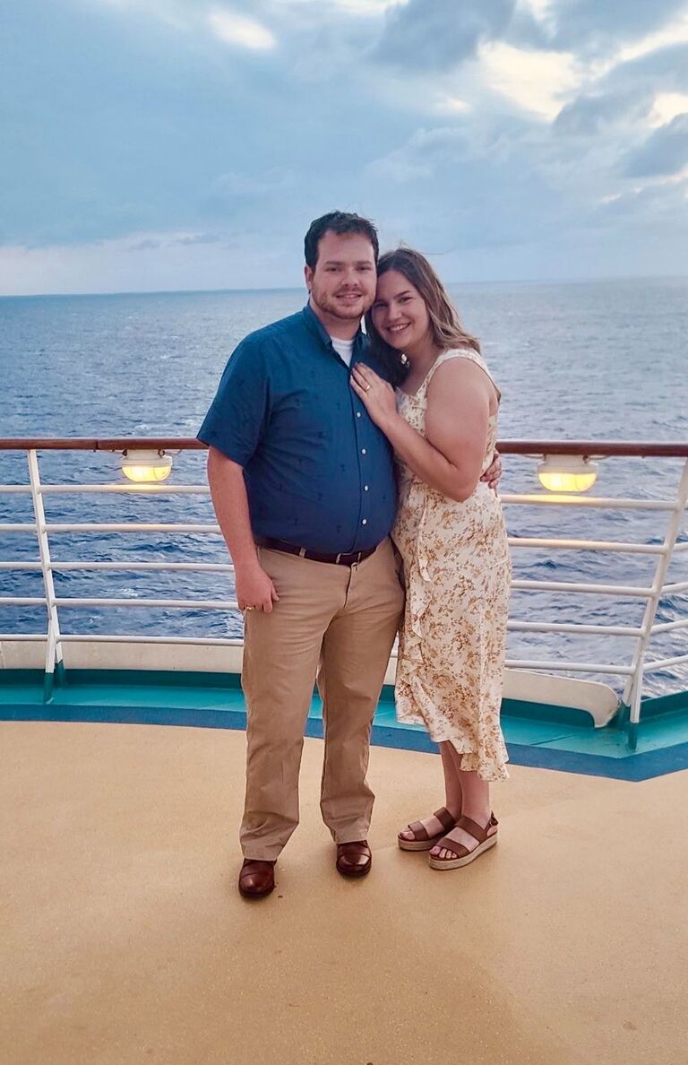 Zac proposed to Alyson on their Caribbean cruise. She thought something was up when she saw a ring shaped box in his pocket. After an amazing day, he first gave her a ring pop to "hold her over" until she graduated. She turned back around to see him on one knee with a diamond ring and immediately said yes! 