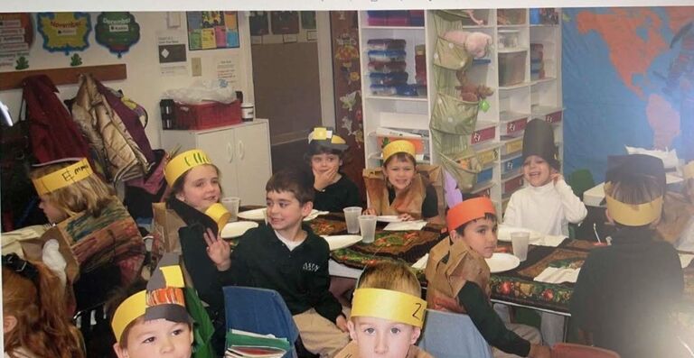 Featured in this photo of Mrs. Lujan's Kindergarten class. The Bride (wearing a paper bag), The Groom (in white), The Best Man (closest to the door), and the Maid of Honor (in front of the jackets)