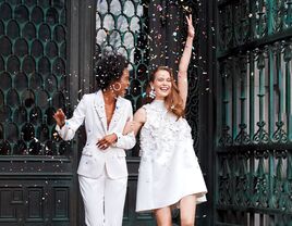 Brides wearing courthouse wedding attire at civil ceremony