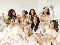 bridal party dancing in champagne bridesmaid robes