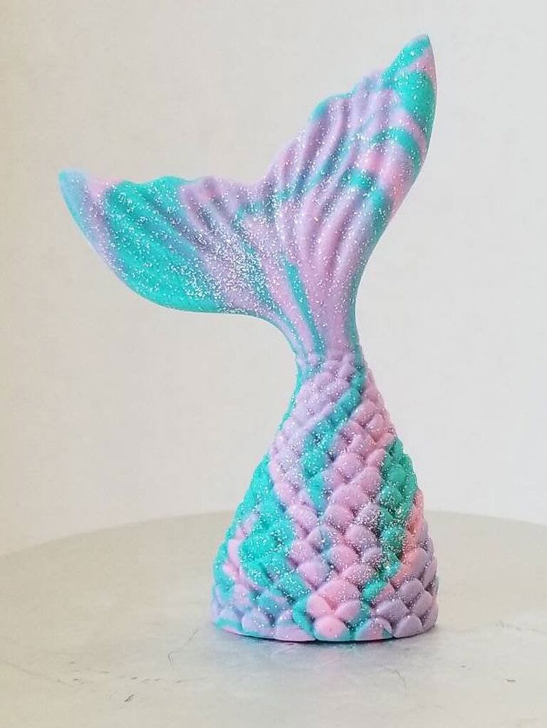 Shimmery mermaid tail cake topper