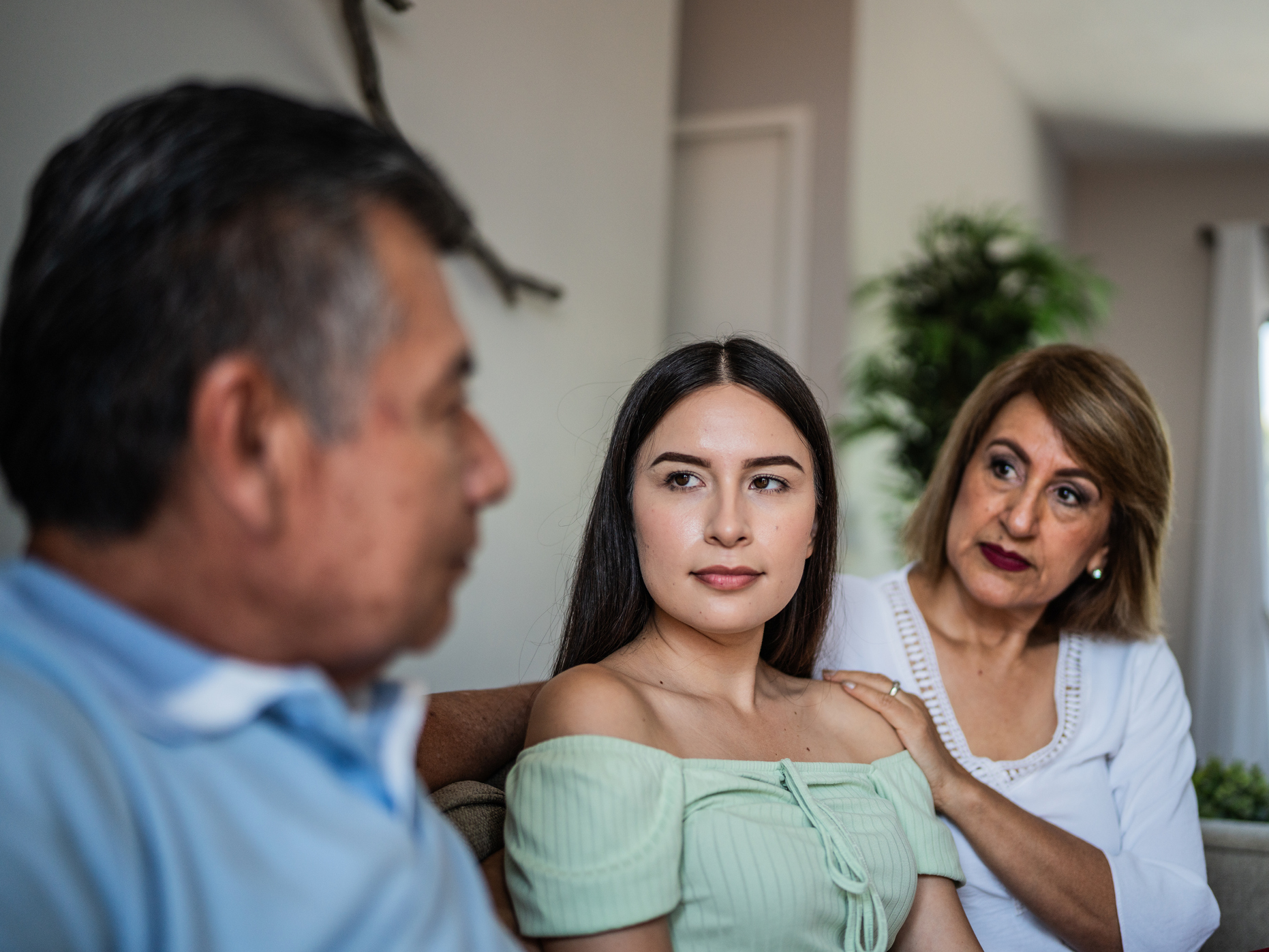 daughter talking to parents about engagement
