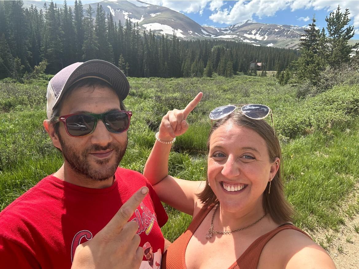 CHECKING OUT THE WEDDING SPOT: We made the 1.5 hour trip from our Airbnb to Alma and Breckenridge to check out wedding spots. This picture shows us pointing to the spot where we will get married on August 1, 2026. We found the Airbnb and took a photo of us out front, but we cannot wait to explore the full property and find the exact right spot. We also explored Fairplay CO, which is the inspiration for South Park. Then, we headed to Breckenridge. 