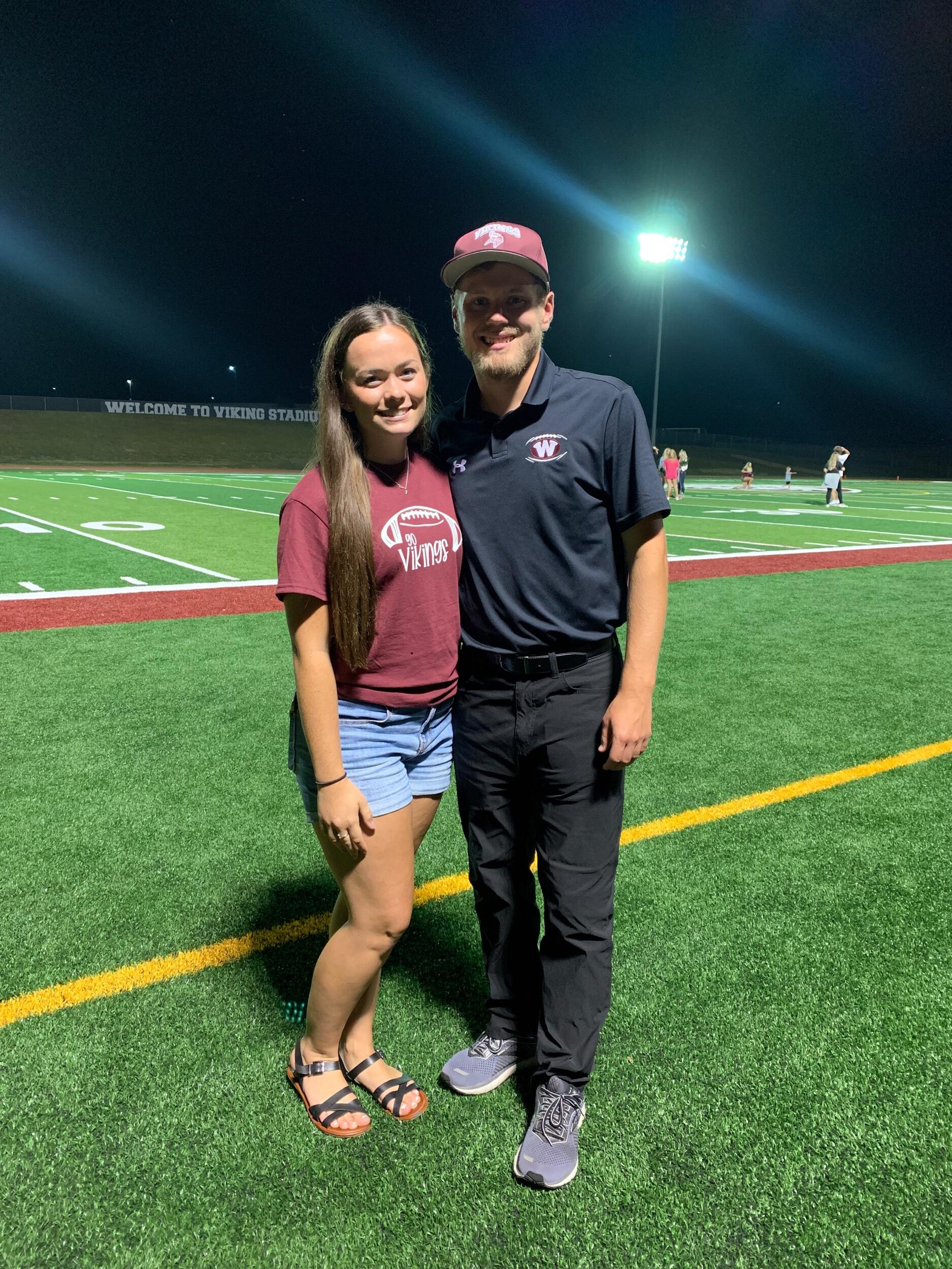 Hunter takes the football field as Coach Smith