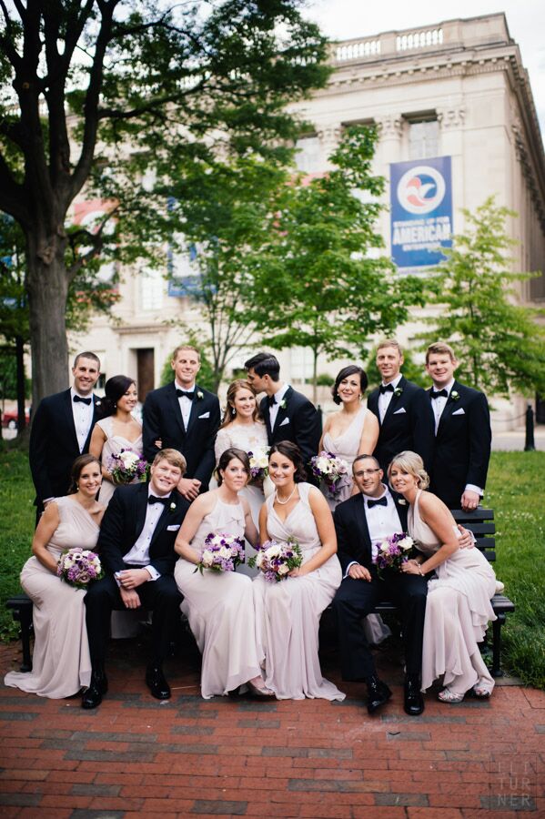 Wedding Party In Taupe Dresses And Black Tuxedos