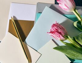 Flowers with cards and a pen