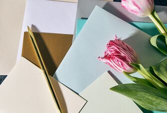 Flowers with cards and a pen