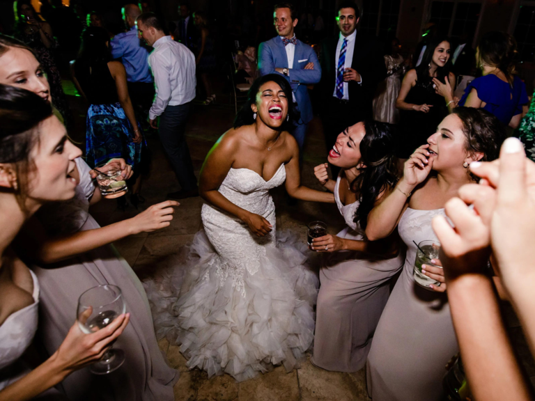 Bride and bridesmaids singing at wedding with music by Premier Wedding DJs in Pittsburgh