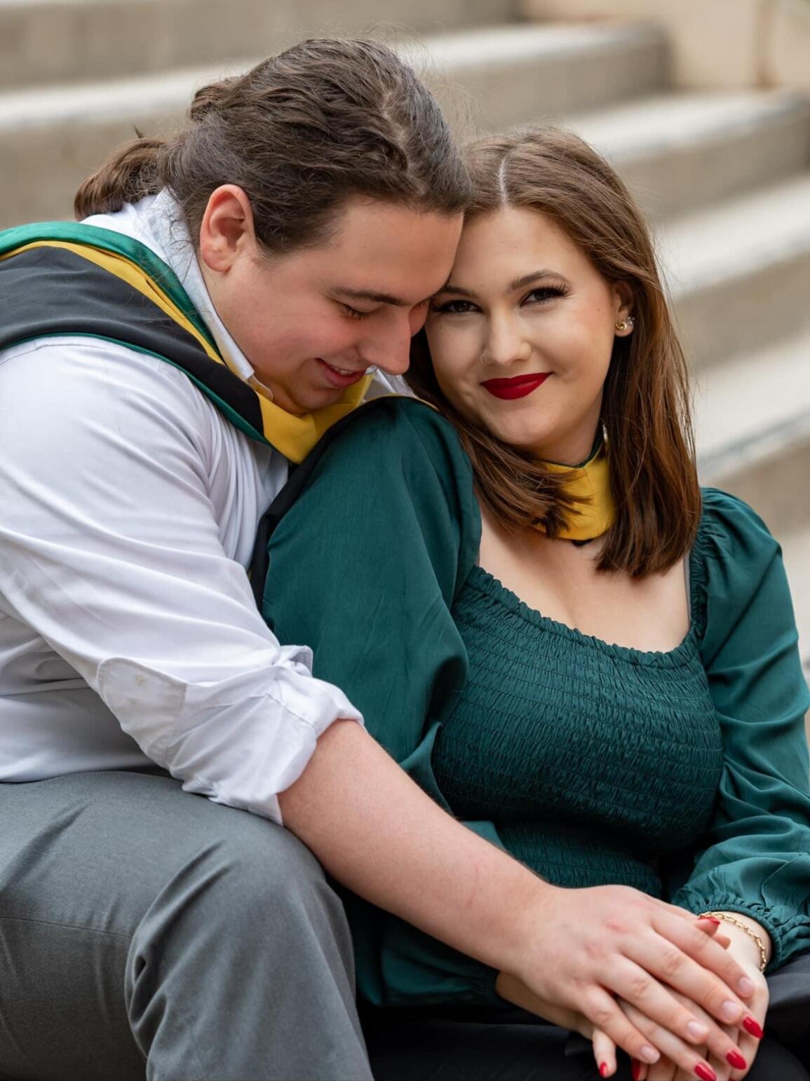 They may have been a little late taking these graduation photos.
