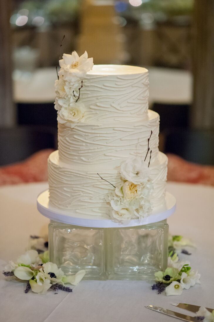 Ivory Wedding Cake On Clear Stand