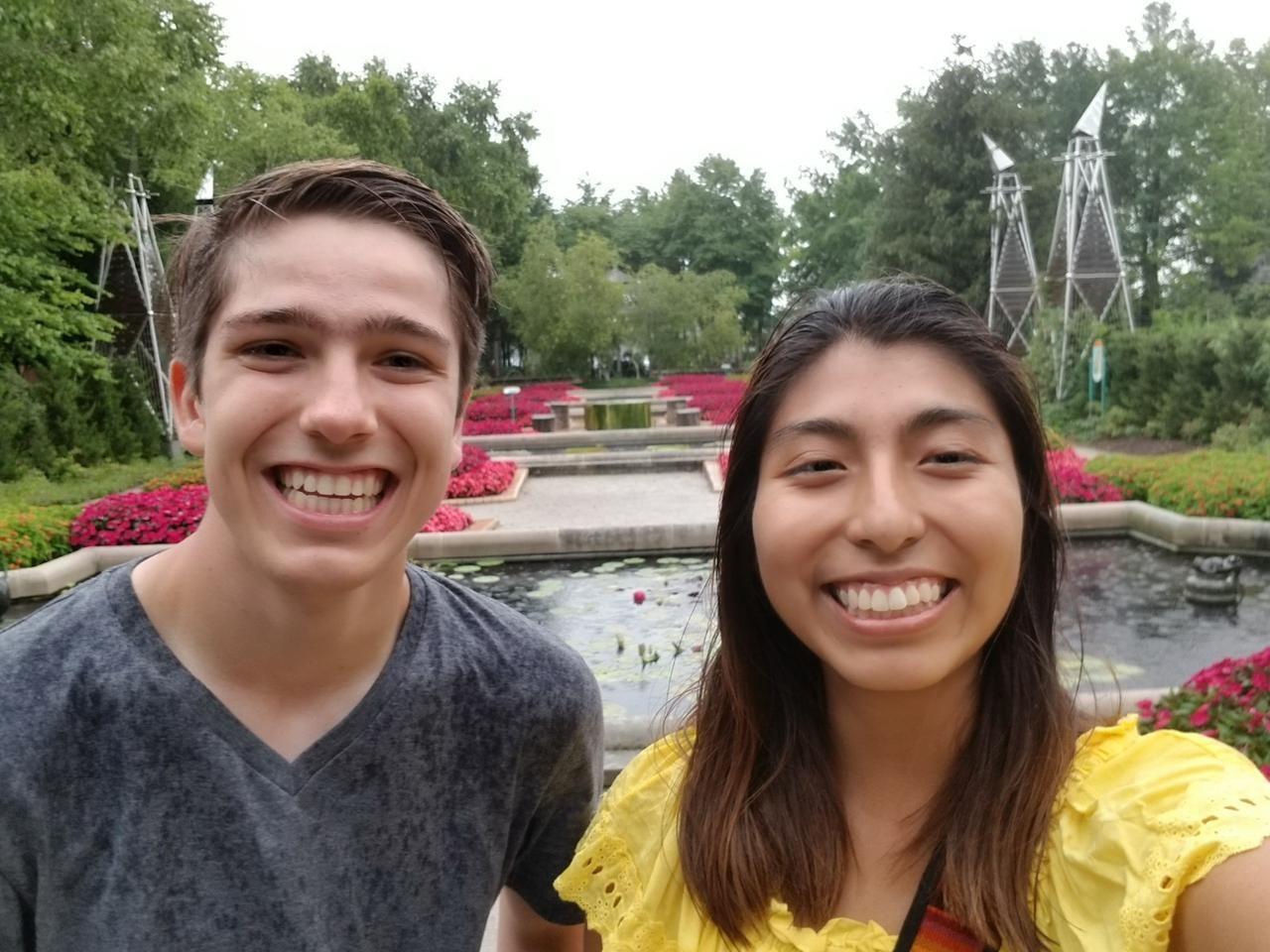 Our first official date! After a long summer canvassing, we decided to have some fun at the zoo. We had just started heading out when we saw that we missed the gardens. An employee advised us to take cover if we planned on going out since it was going to start raining. We don't think we gave it much thought per the picture, and it turned out to be the highlight of the date :) 