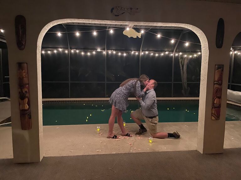 He opened the ring upside down...
She said YES