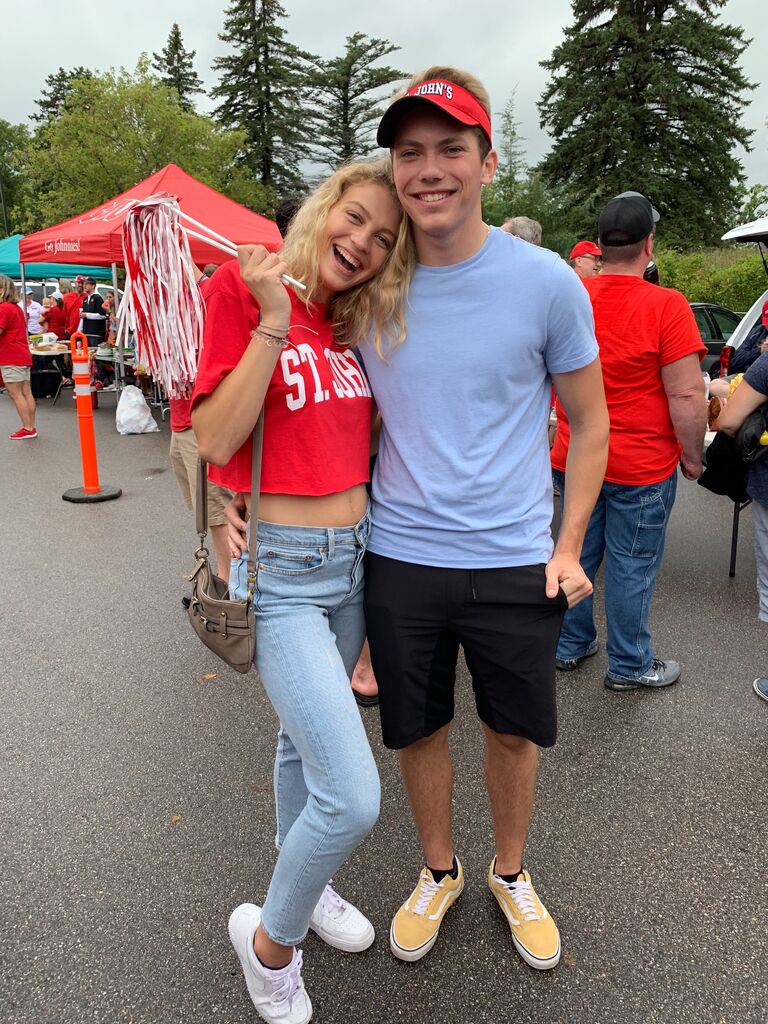 Brock and I were long distance for the 4 years of college, me at College of Saint Benedict, him at South Dakota State University. Our weekends were often filled with 3.5 hour drives to visit each other. This was a period of growth, trust, sadness, and fun in our relationship. Pictured is us at Brock's first SJU football game!