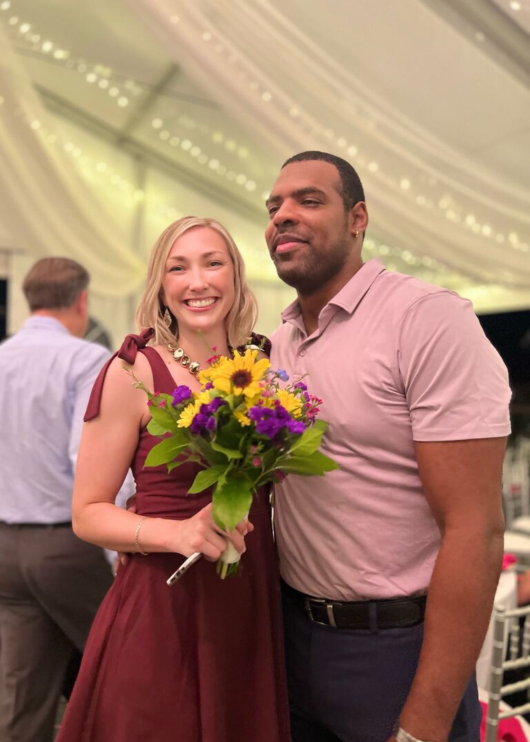 Caught the bouquet at my cousin Carlie's wedding! Tristan not as amused, but here we are! ;)