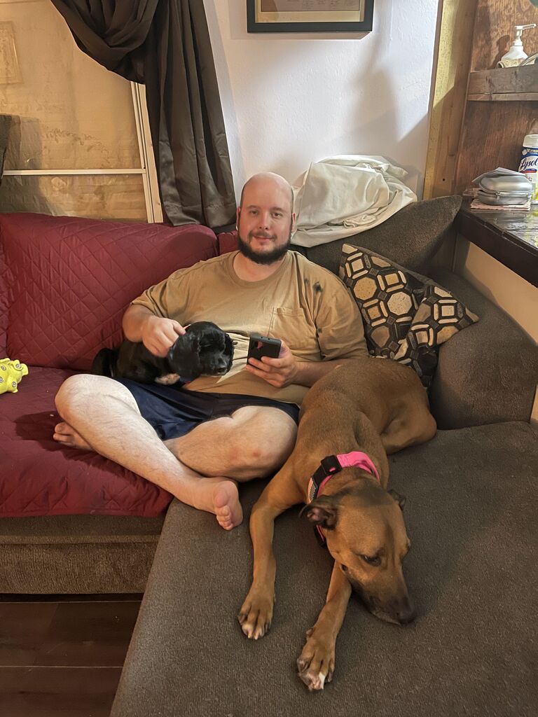 The day Adam accepted being a dog dad lol