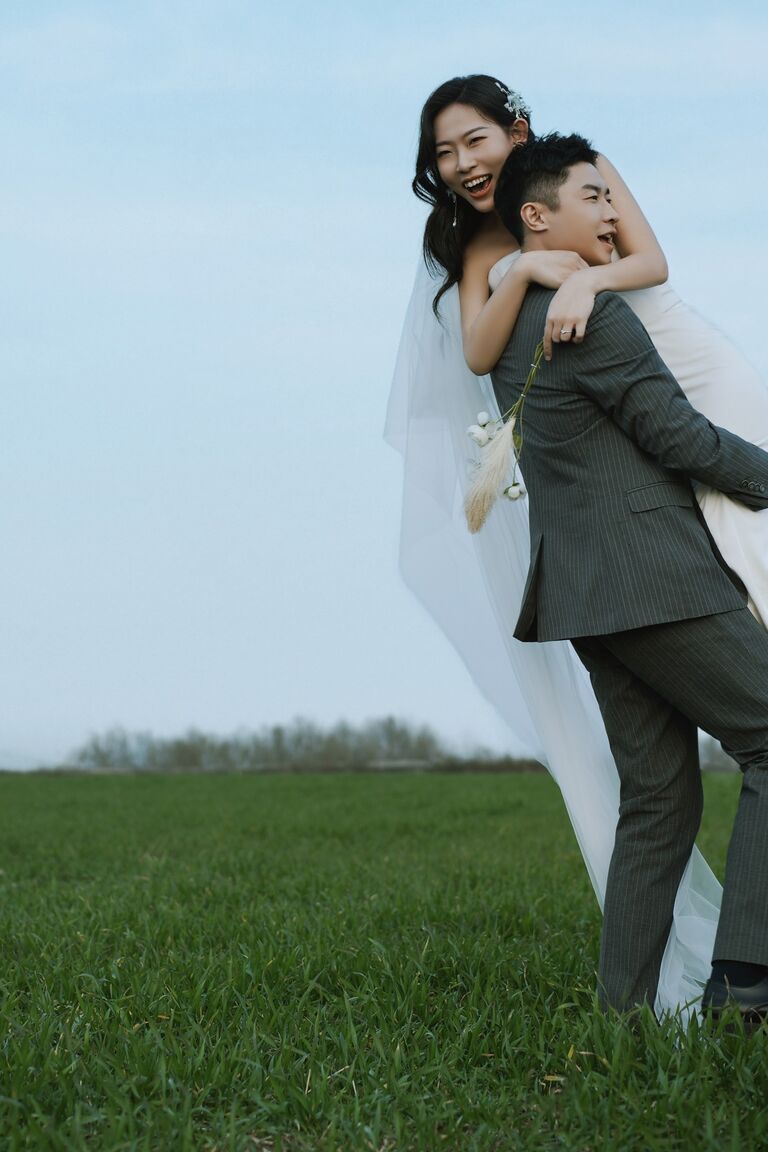 Got married in China! 
(Ke carrying the weight of the world on his shoulders)
