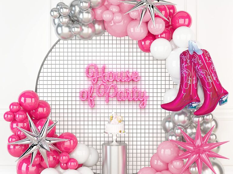 Hot Pink Pearl Pink Silver White Balloons with Spiky Star Foil Balloons and Cow Print Backdrop for Western Party