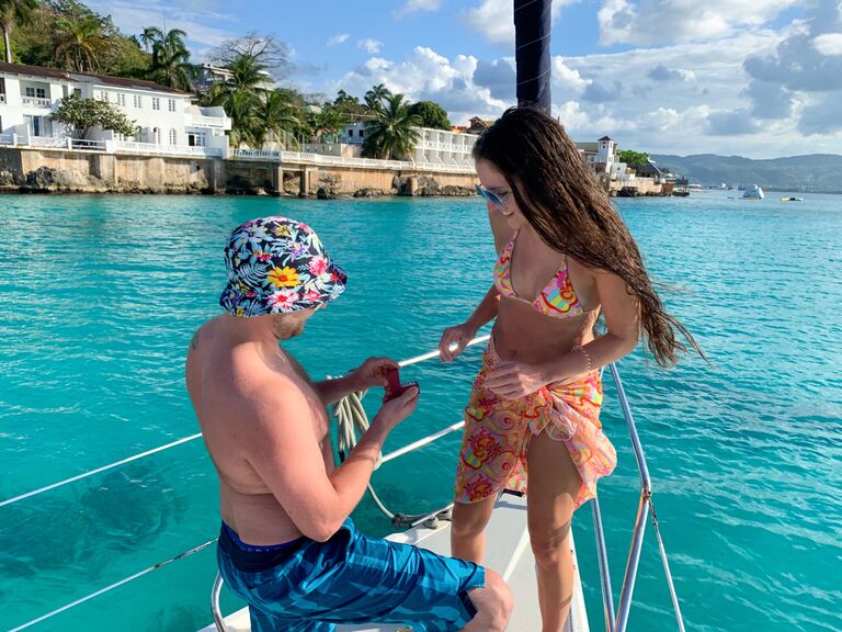 In Jamaica, he got down on one knee. When he decided to go pick out rings that week we also found out we were expecting!