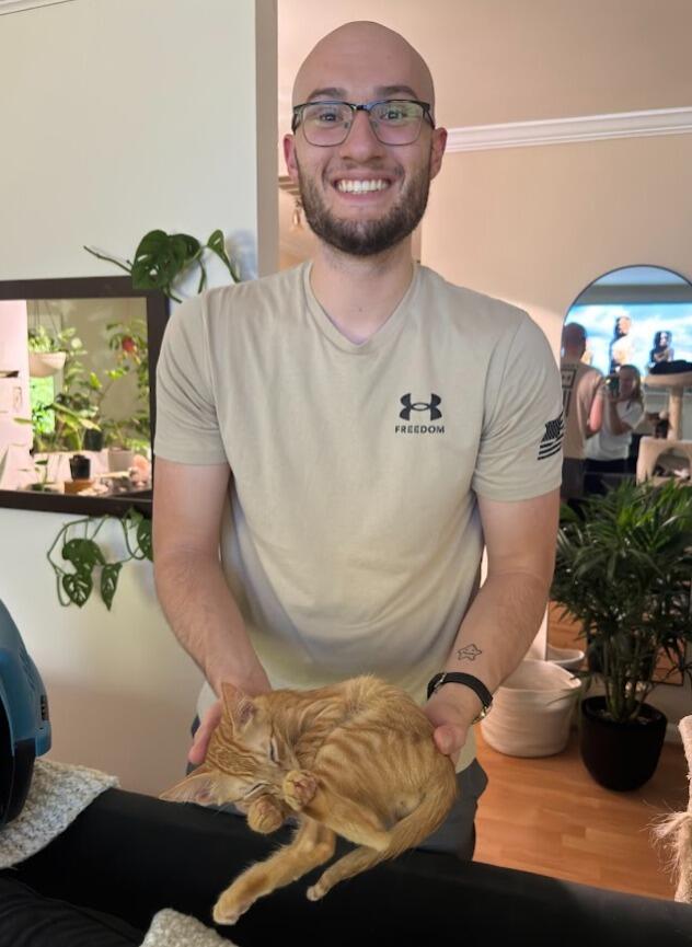 Living Life Over the Years:  Because we HAVE to mention the guy. We adopted our third cat, Julius, or Juju. He is a demon. We love him though.....sort of...
