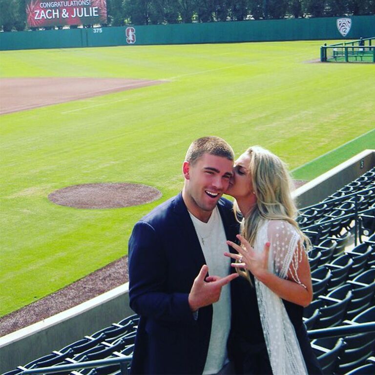 Julie Ertz showing off her engagement ring and kissing Zach Ertz's cheek after his proposal