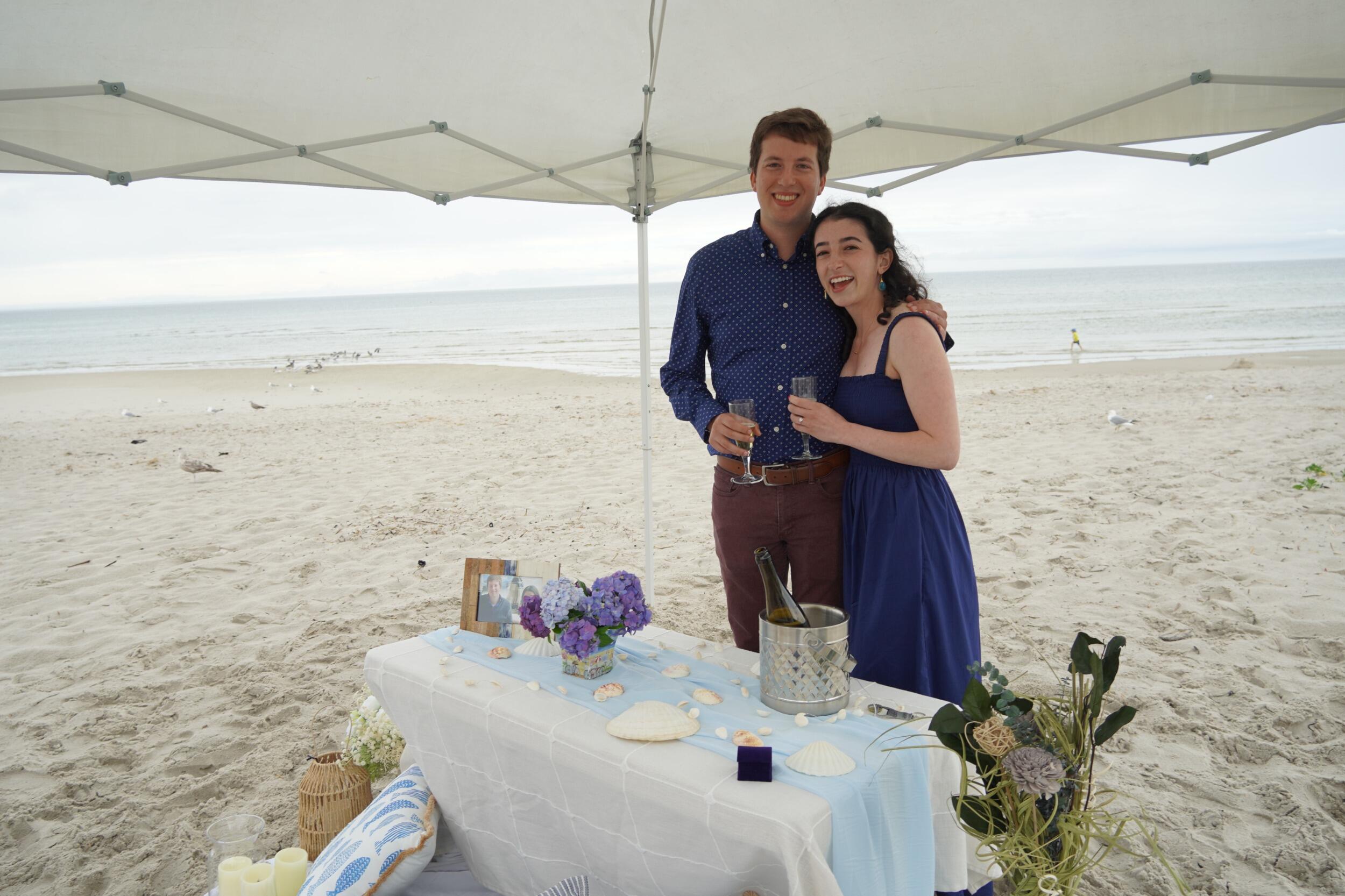 The proposal - The Swartzes and Moores came to visit Natalie and Haim on Cape Cod. Behind the scenes, Haim's sister Hili - along with a crew of dear family and friends - helped prepare a beautiful display on the beach. With loved ones hiding behind the sand dunes (and Natalie's sister Amanda hiding under a lifeguard stand to capture the moment), Haim proposed!!! 