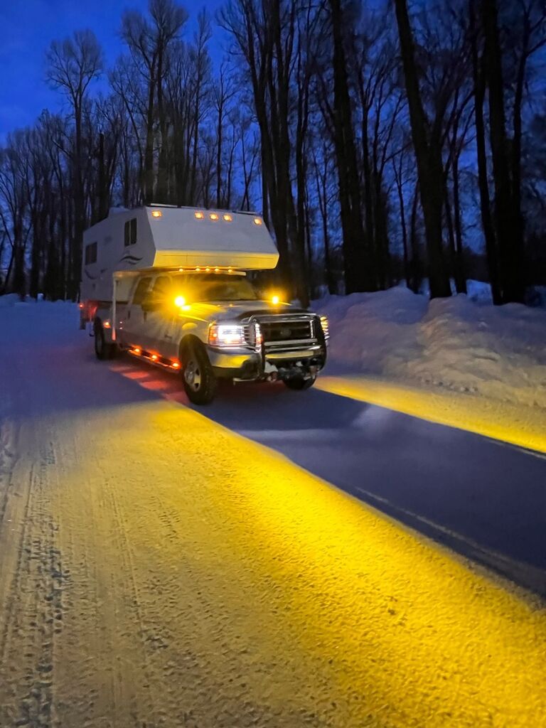 We bought a 7.3L diesel dually truck and a winter ready truck camper and hit the road,  intending to do the powder highway in Canada. 