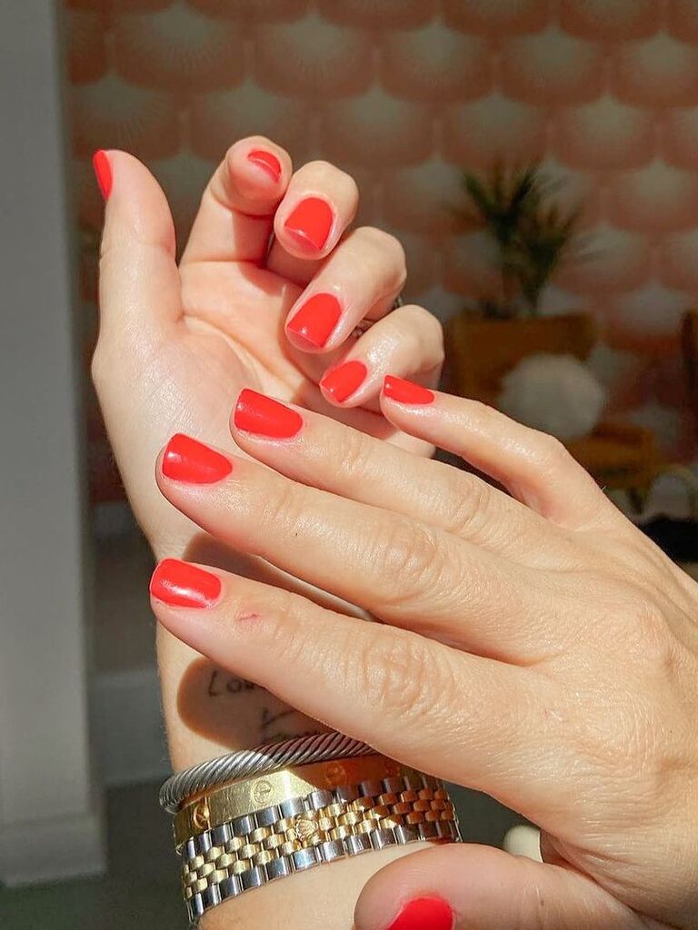 Short red bachelorette nails