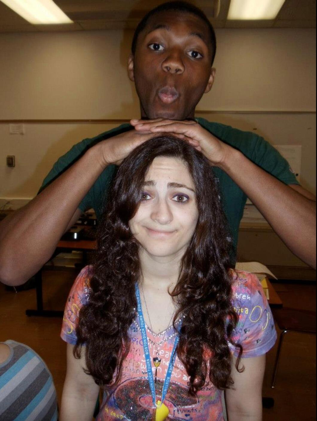 The last day of our senior year of high school. We met in journalism in Lab 201, which is where this photo was taken. We spent many late nights together designing the paper and grew close when Amanda would drive Kellen home. Months before we started dating, we spent a lot of time parked in Kellen's driveway getting to know each other.