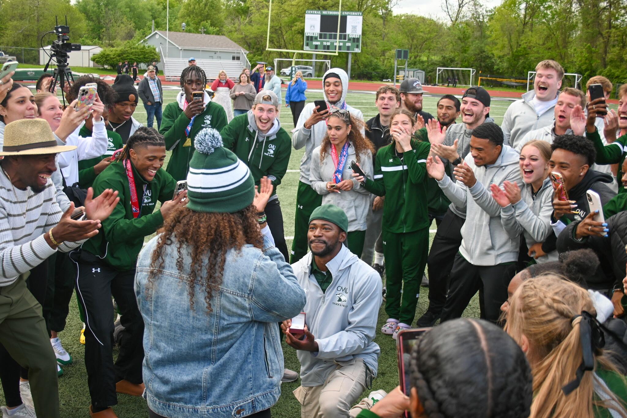CMU hosted the Heart of America Athletic Conference Outdoor Track & Field Meet. After helping coach both men’s and women’s teams to conference wins and rings, Tevin surprised Mackenzie with her own ring, proposing in front of a group of very excited athletes.