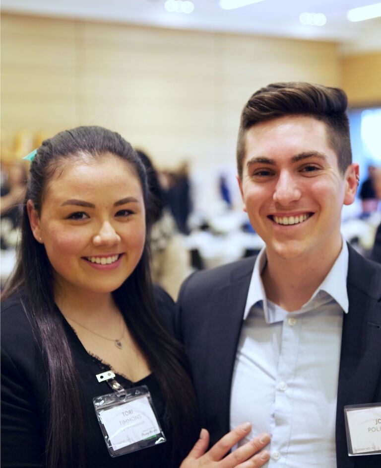 Tori and Joe attend the fundraiser Tori organized for the Undergraduate Women in Business club.