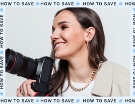 Photographer smiling and holding camera