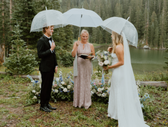 Couple married by officiant in the rain