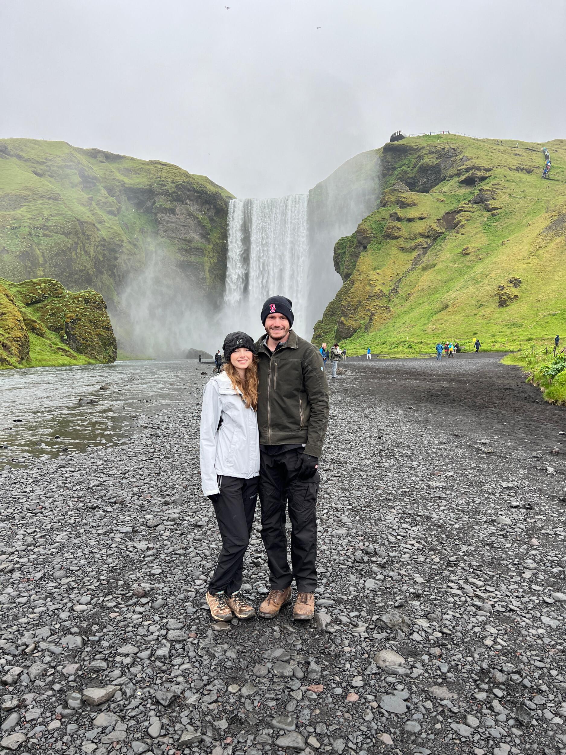 How will we ever top this? Our first international vacation together was to Iceland! We saw many waterfalls, glaciers, and even got to eat exotic foods. Here is us at Skogafoss waterfall. 