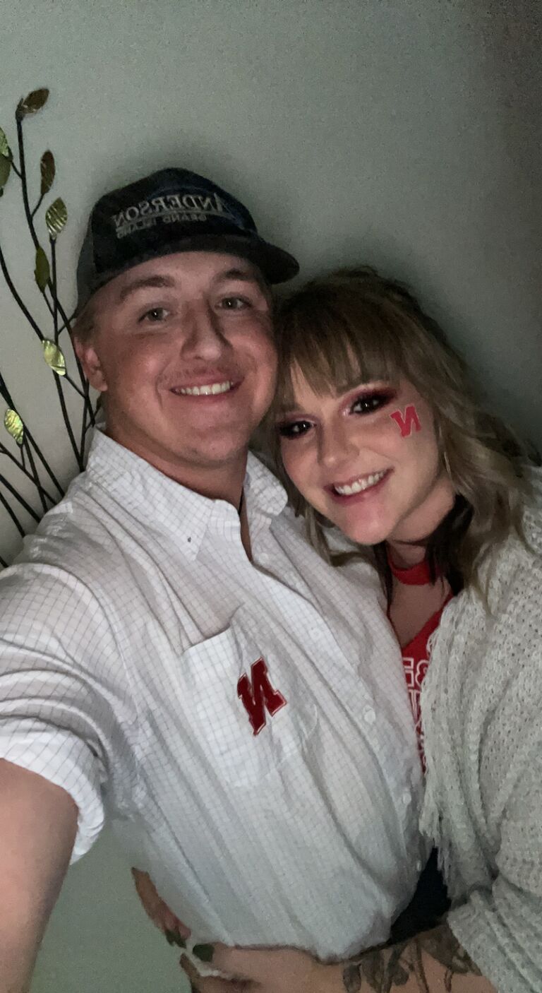 Our second date. Invited him over to watch the Huskers play football. Also First time I cut his hair.