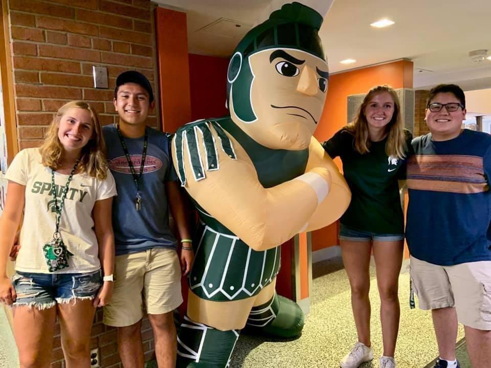 Best man and maid of honor dropping Brandon and Carley off at Michigan State University in East Lansing. Brandon and Carley ended up living in neighboring dorms in the south neighborhood due to their degrees.