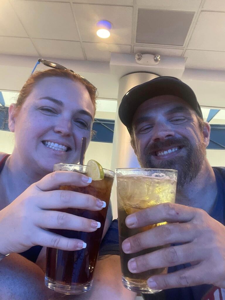 Getting drinks in the airport waiting for our flight back home from Buffalo.