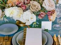 Rustic place setting with colorful rose centerpiece