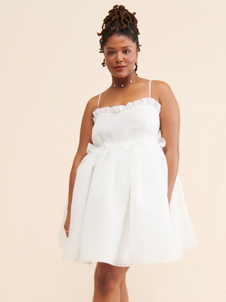 White rehearsal dinner minidress with ruffle details from Selkie