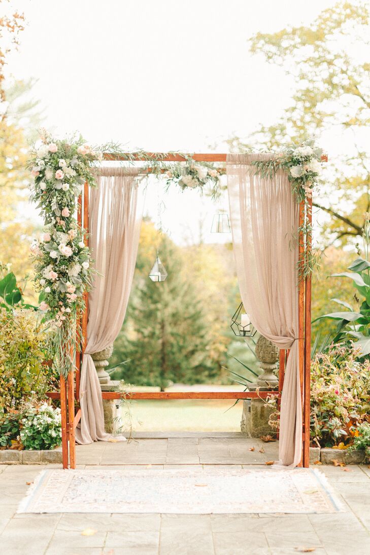 Geometric Lantern and Blush Organza Decorated Wedding Arch