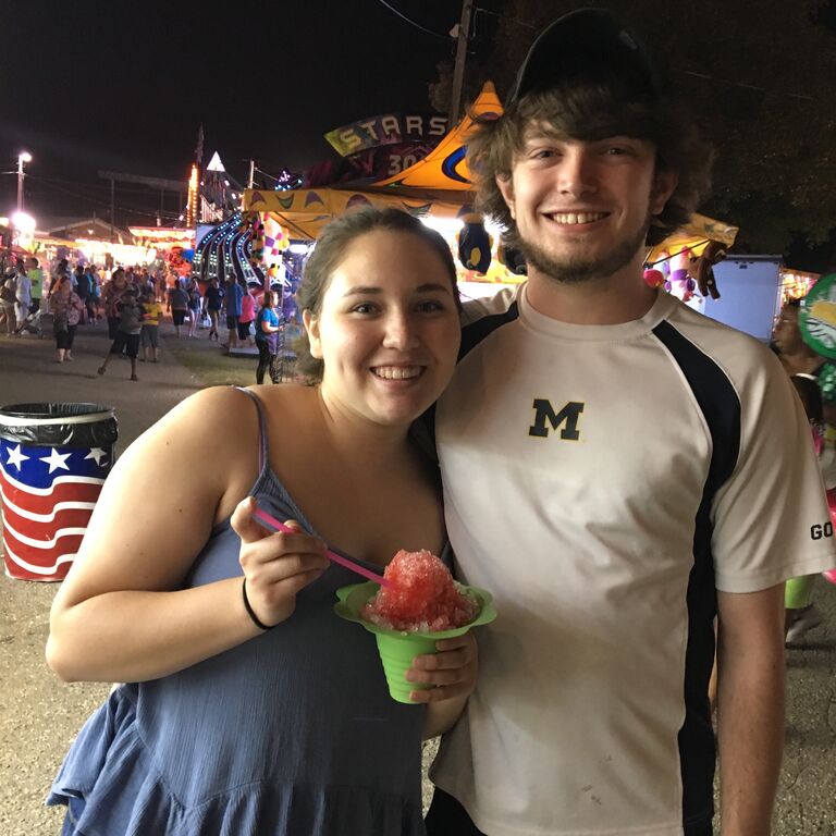 At the St. Joseph County Grange Fair. Olivias hometown fair and one of her favorite places, Kyles first of MANY times attending said fair. About 9 months. 