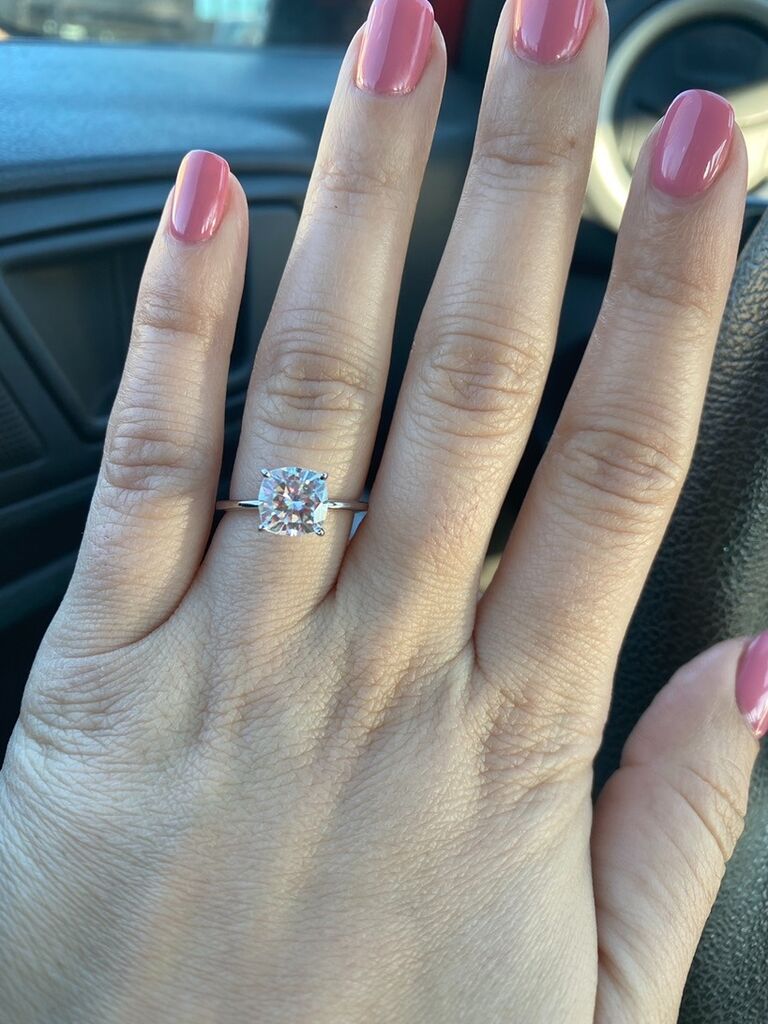 We're engaged! We closed on our first home the exact same day. After our appointment, we went to our new home to scope the place out for the first time as owners. Manny open the door and within seconds he was on one knee, ring in hand: "Spend Forever with me?"
