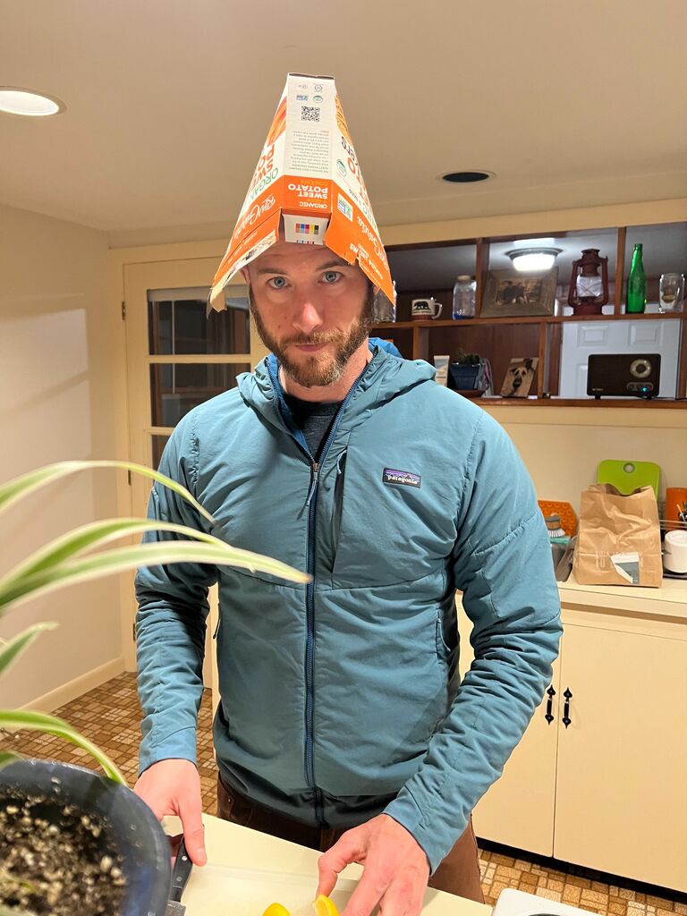 Tom trying out a new style of hat. 