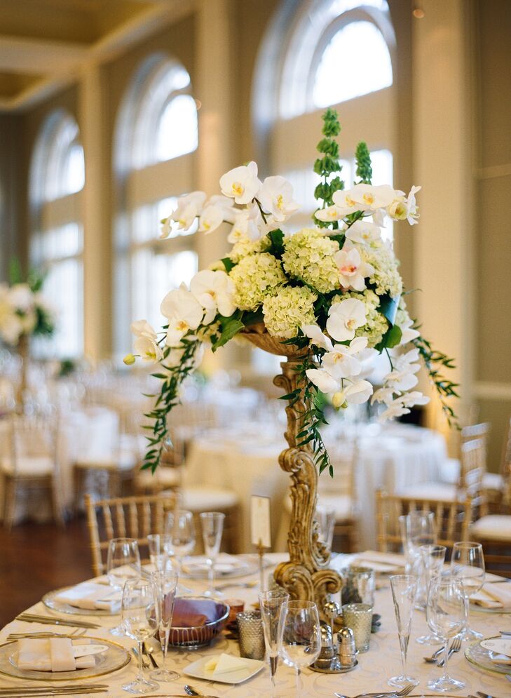 Tall Gold Centerpiece with Overflowing White Flowers