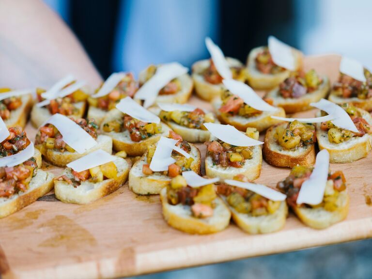 A tray of tomato and cheese bruschetta for your wedding cocktail hour