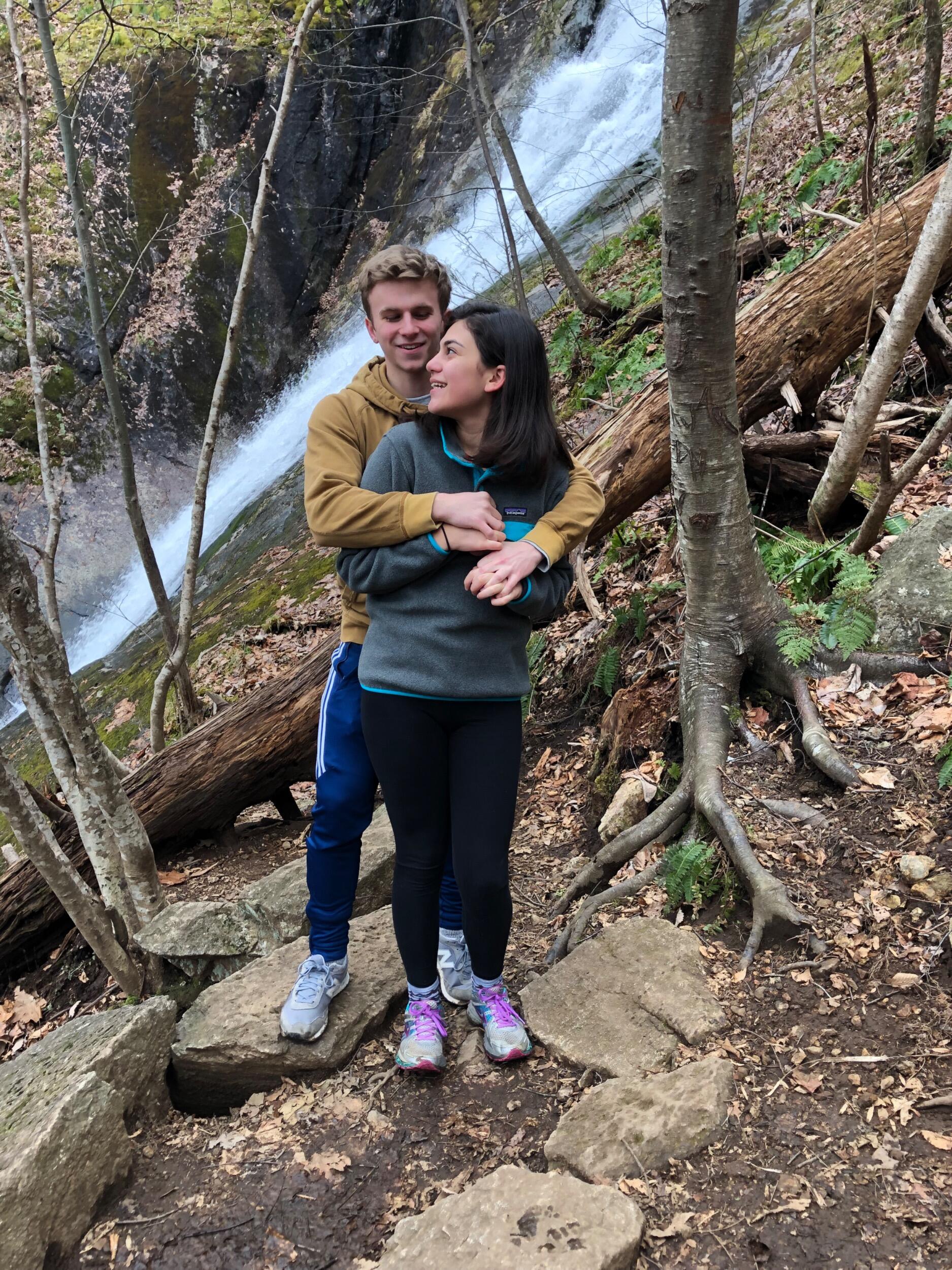 We have always loved hiking together. In fact, hiking St. Mary's was one of our first dates! Here we are at Crabtree Falls.