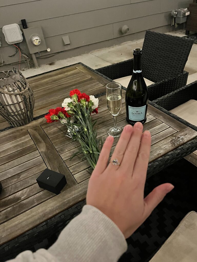 Luke proposed on out back patio playing our song "Yellow" by Coldplay