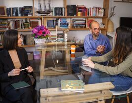 Couple talking to a premarital counsellor