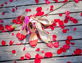 Wedding day heels and rose petals